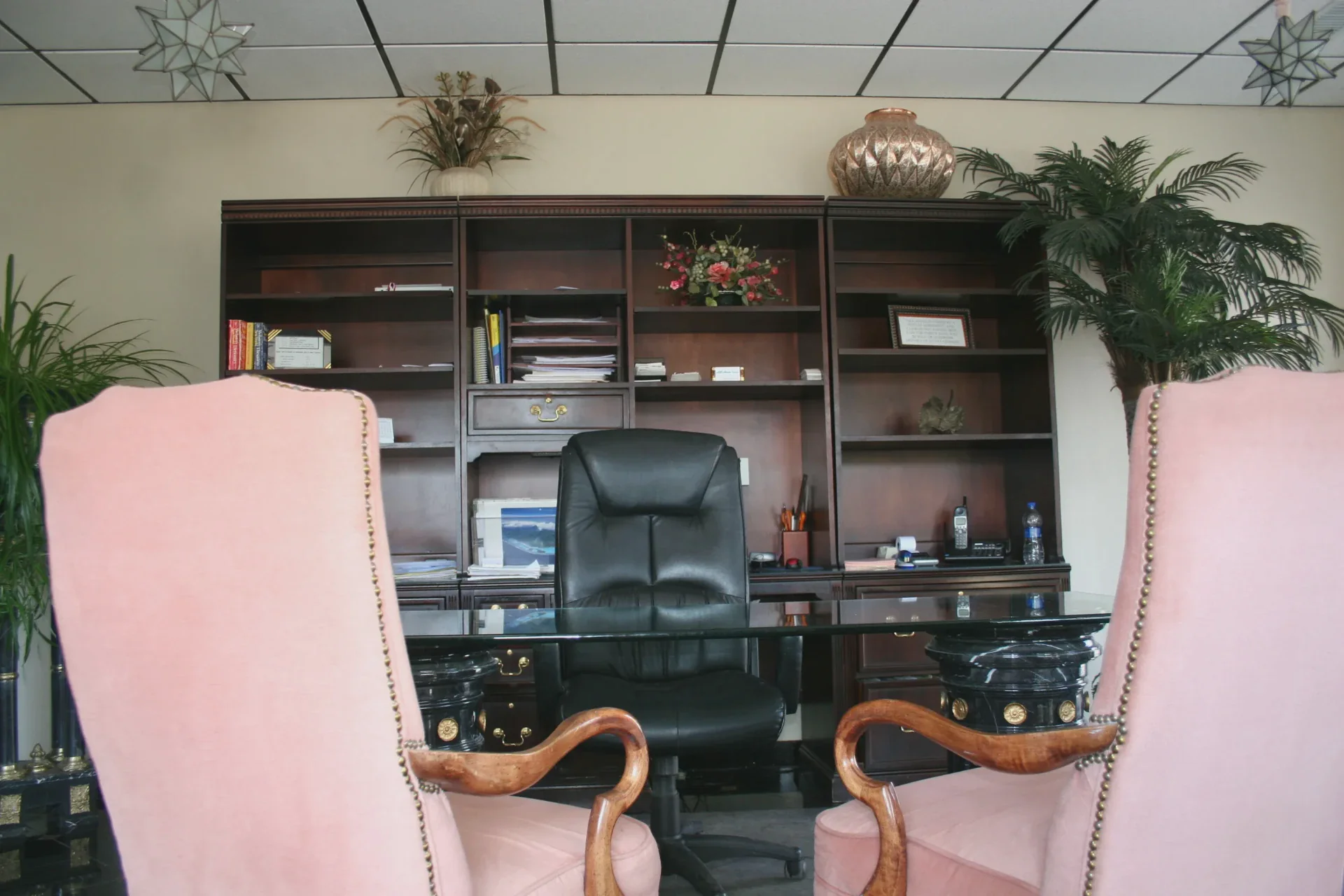 The All Hours Storage office in Basalt, Colorado, with built-in shelving behind the desk and guest chairs for visitors